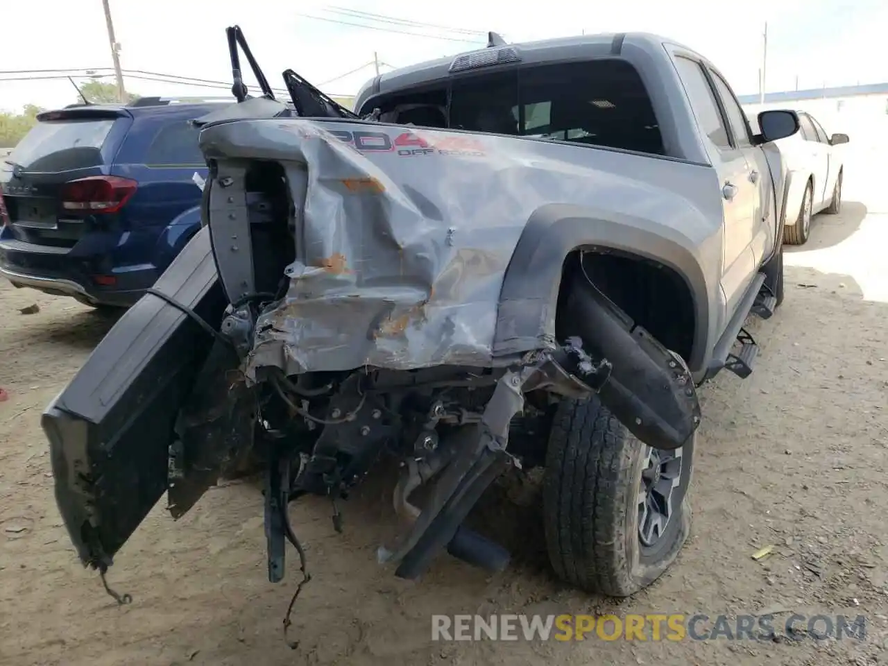 4 Photograph of a damaged car 3TMCZ5AN3KM198423 TOYOTA TACOMA 2019