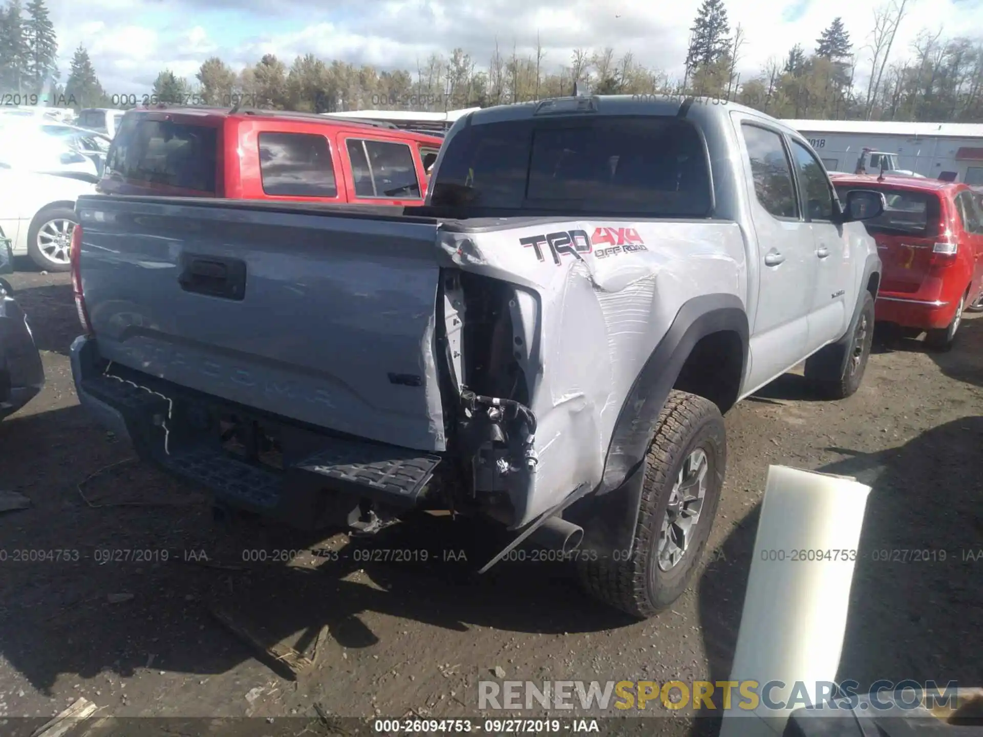 4 Photograph of a damaged car 3TMCZ5AN3KM201269 TOYOTA TACOMA 2019