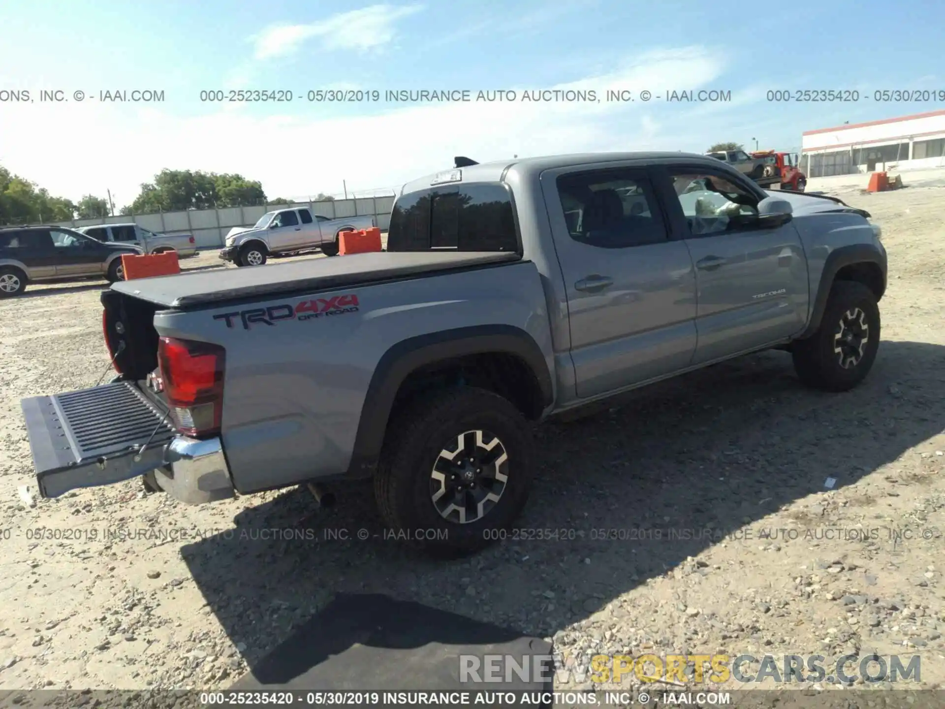 4 Photograph of a damaged car 3TMCZ5AN3KM201451 TOYOTA TACOMA 2019