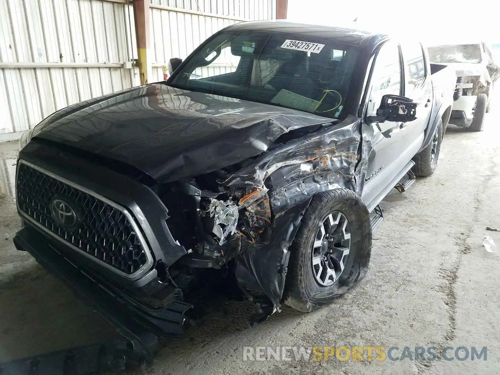 2 Photograph of a damaged car 3TMCZ5AN3KM203636 TOYOTA TACOMA 2019