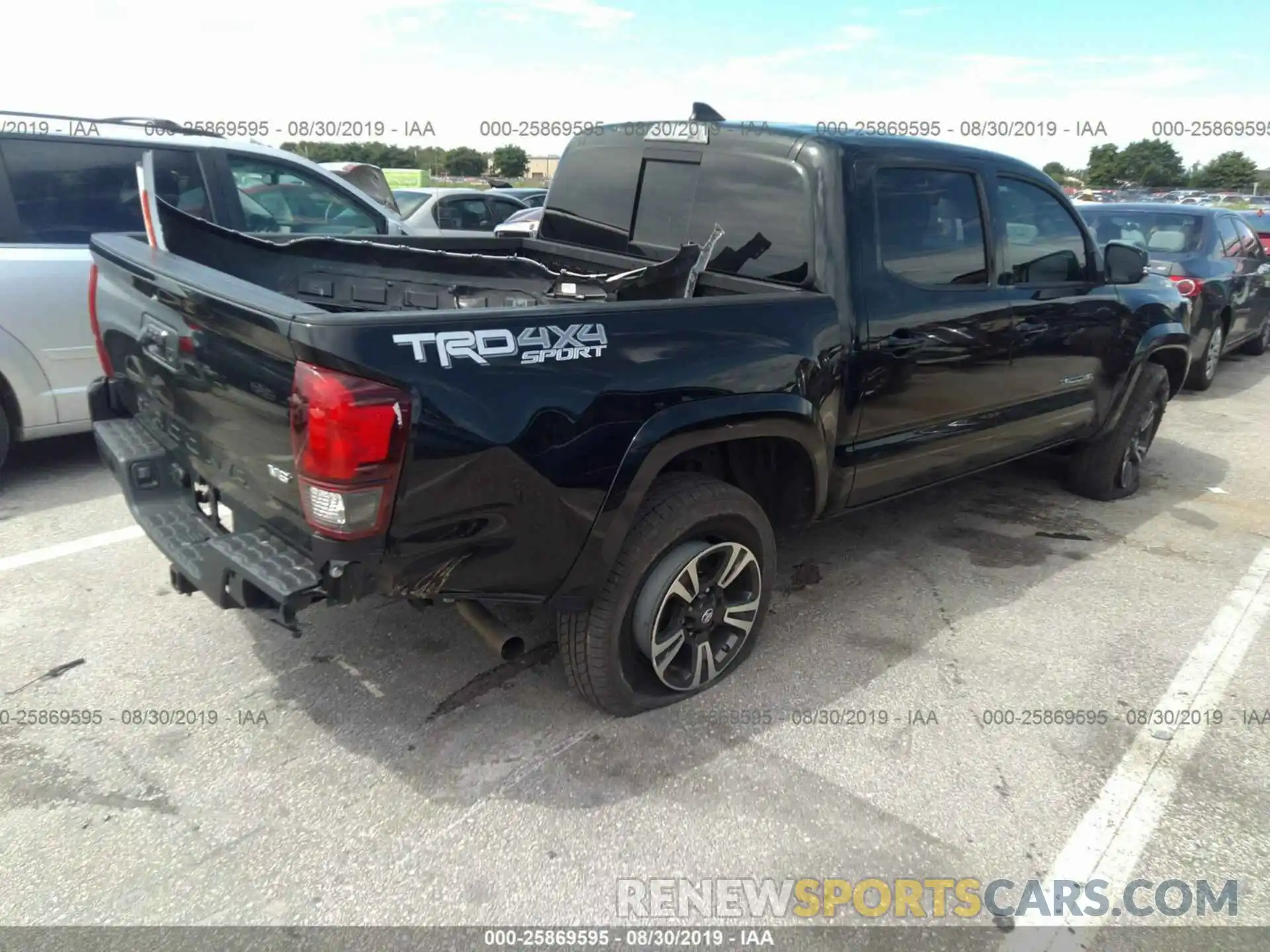 4 Photograph of a damaged car 3TMCZ5AN3KM206472 TOYOTA TACOMA 2019