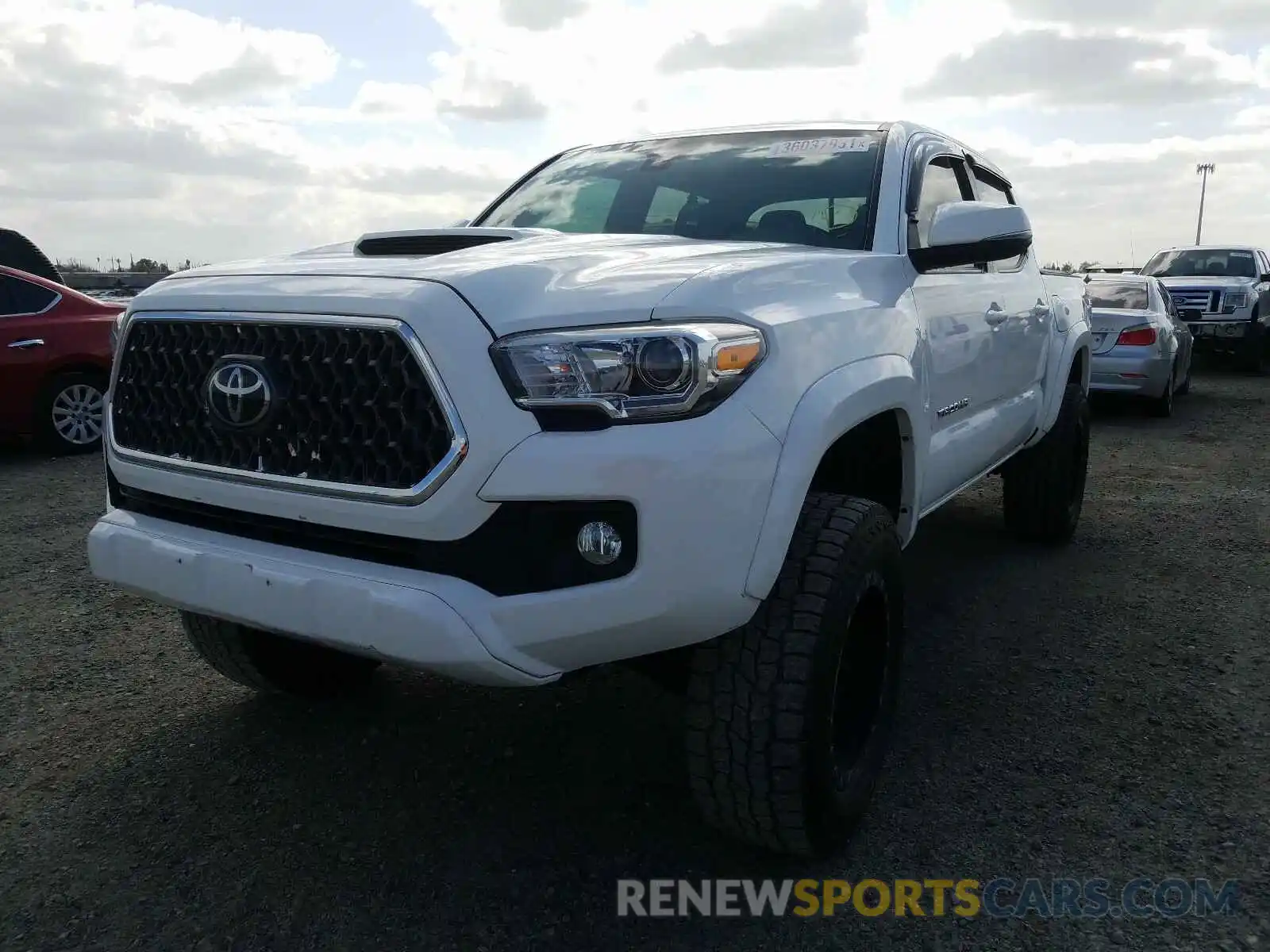 2 Photograph of a damaged car 3TMCZ5AN3KM207007 TOYOTA TACOMA 2019