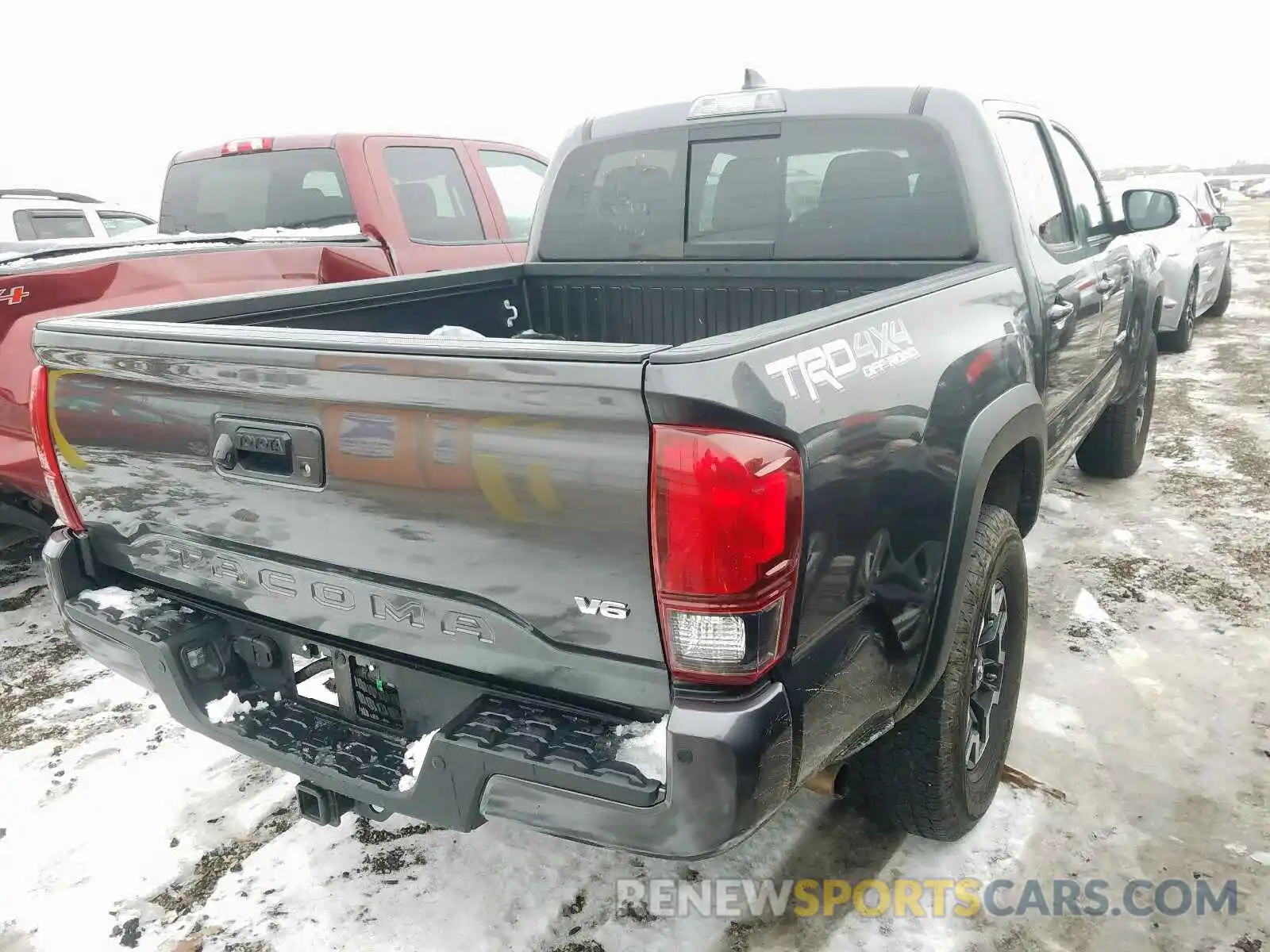 4 Photograph of a damaged car 3TMCZ5AN3KM209257 TOYOTA TACOMA 2019