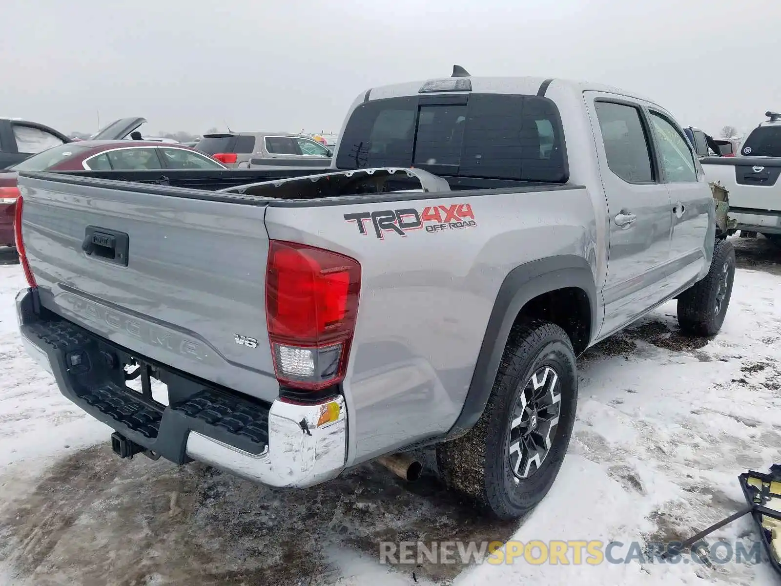 4 Photograph of a damaged car 3TMCZ5AN3KM211218 TOYOTA TACOMA 2019