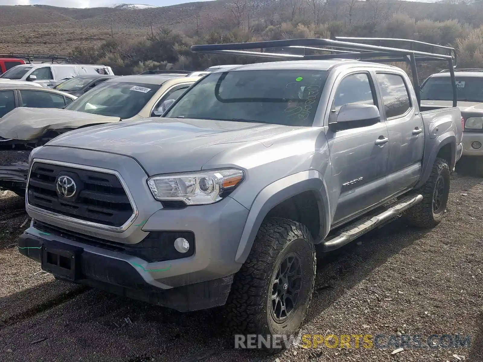 2 Photograph of a damaged car 3TMCZ5AN3KM211929 TOYOTA TACOMA 2019