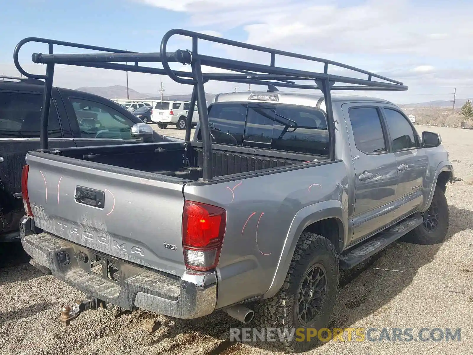 4 Photograph of a damaged car 3TMCZ5AN3KM211929 TOYOTA TACOMA 2019