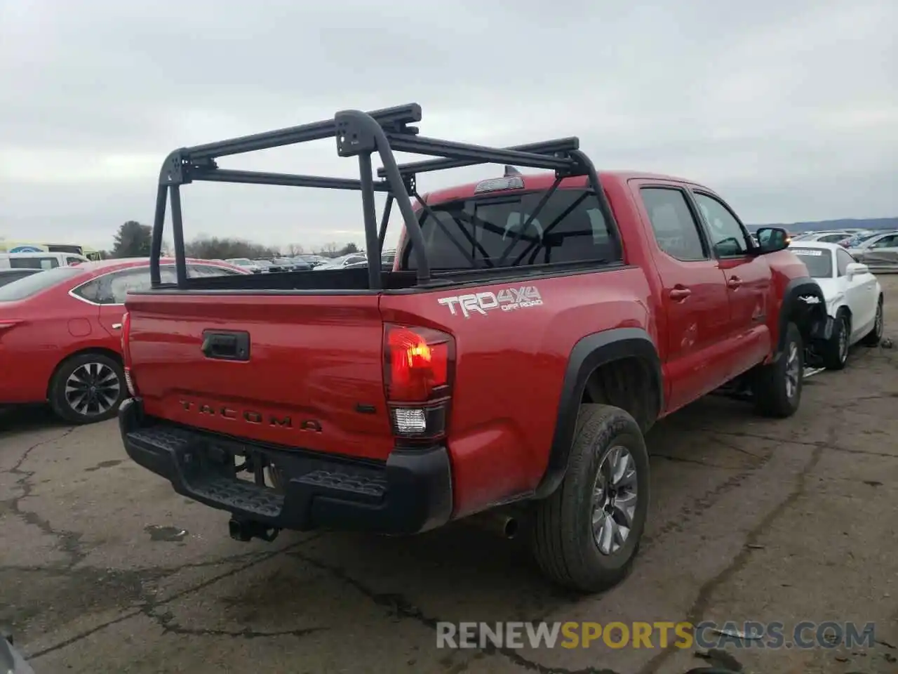 4 Photograph of a damaged car 3TMCZ5AN3KM214216 TOYOTA TACOMA 2019