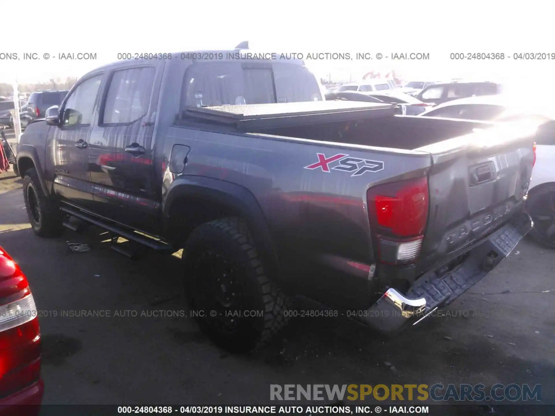 3 Photograph of a damaged car 3TMCZ5AN3KM215138 TOYOTA TACOMA 2019