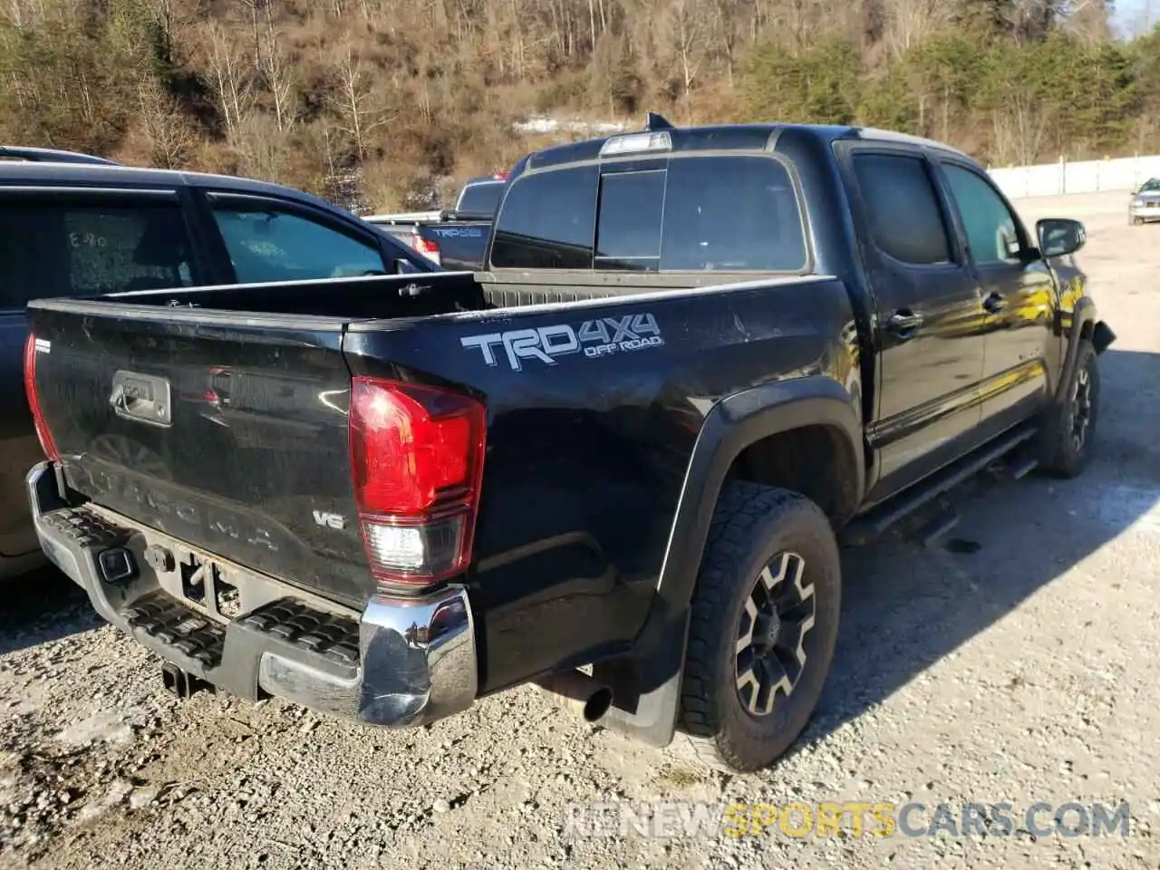 4 Photograph of a damaged car 3TMCZ5AN3KM216919 TOYOTA TACOMA 2019