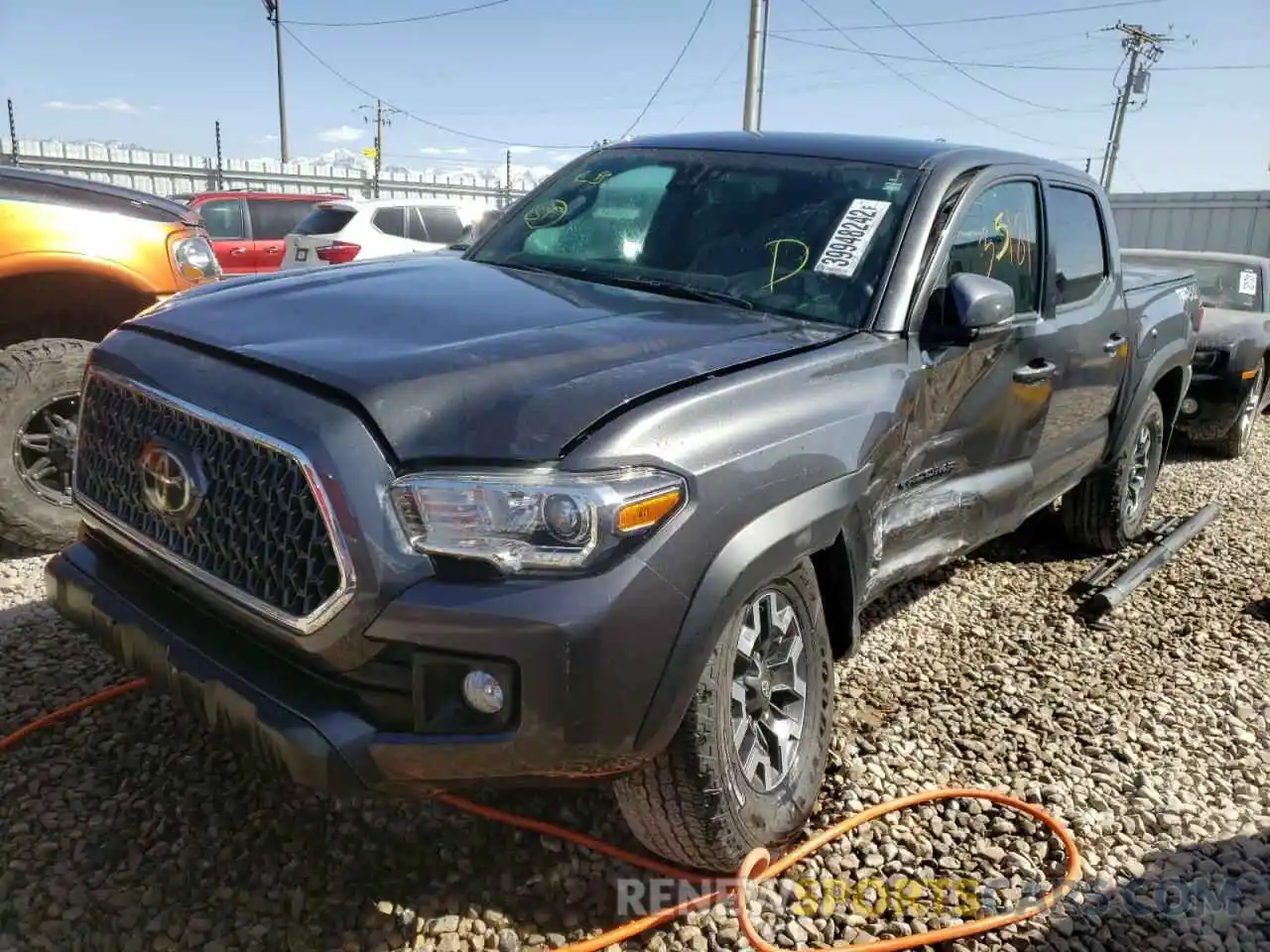 2 Photograph of a damaged car 3TMCZ5AN3KM217875 TOYOTA TACOMA 2019