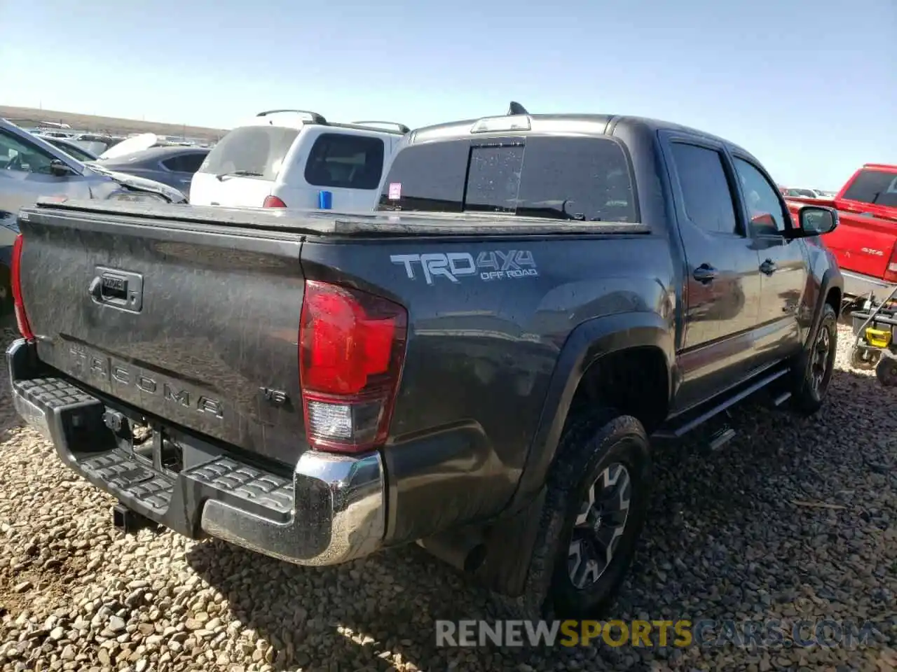 4 Photograph of a damaged car 3TMCZ5AN3KM217875 TOYOTA TACOMA 2019