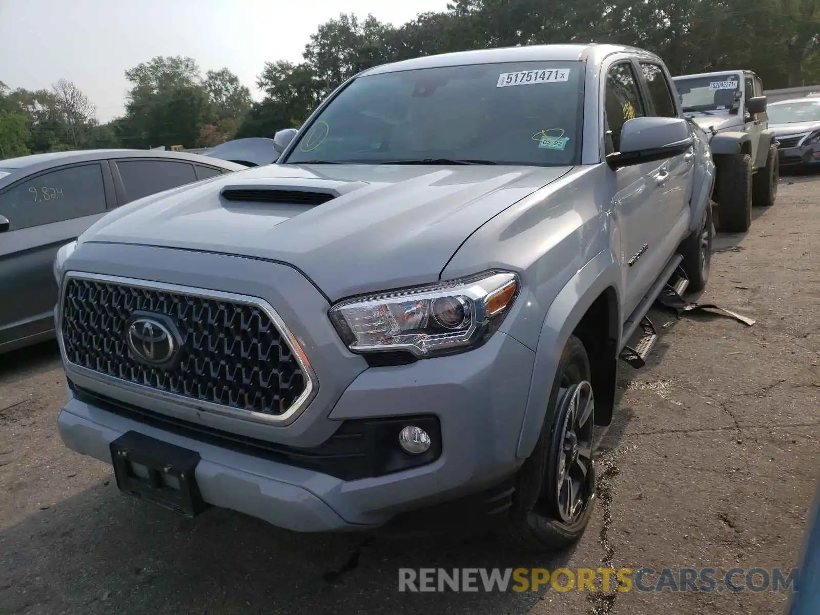 2 Photograph of a damaged car 3TMCZ5AN3KM219089 TOYOTA TACOMA 2019