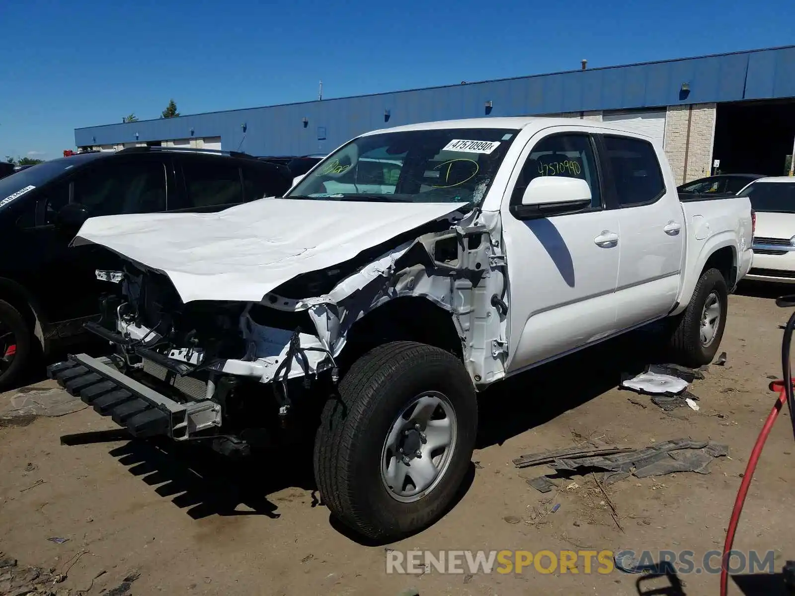 2 Photograph of a damaged car 3TMCZ5AN3KM219674 TOYOTA TACOMA 2019