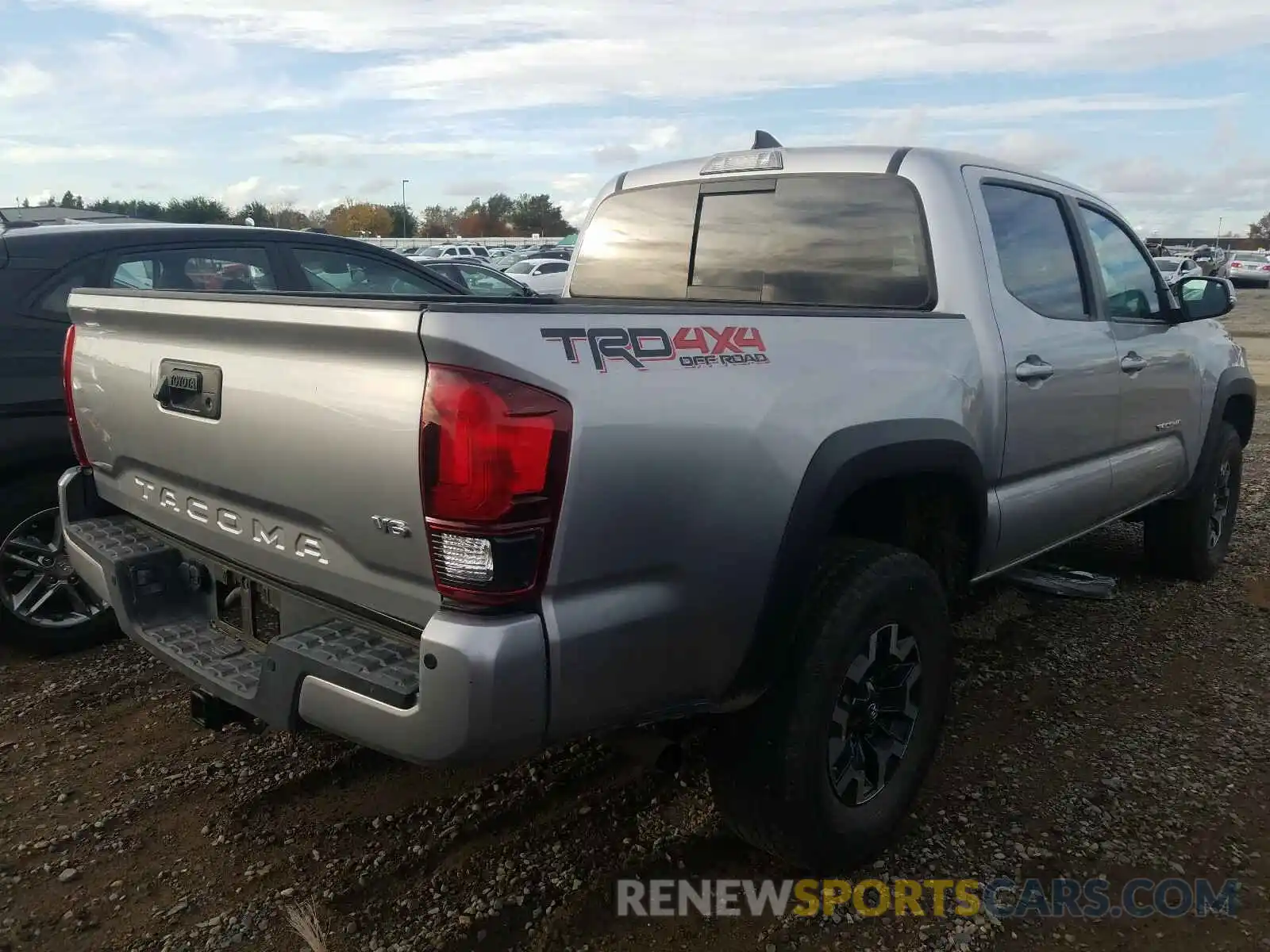 4 Photograph of a damaged car 3TMCZ5AN3KM220940 TOYOTA TACOMA 2019