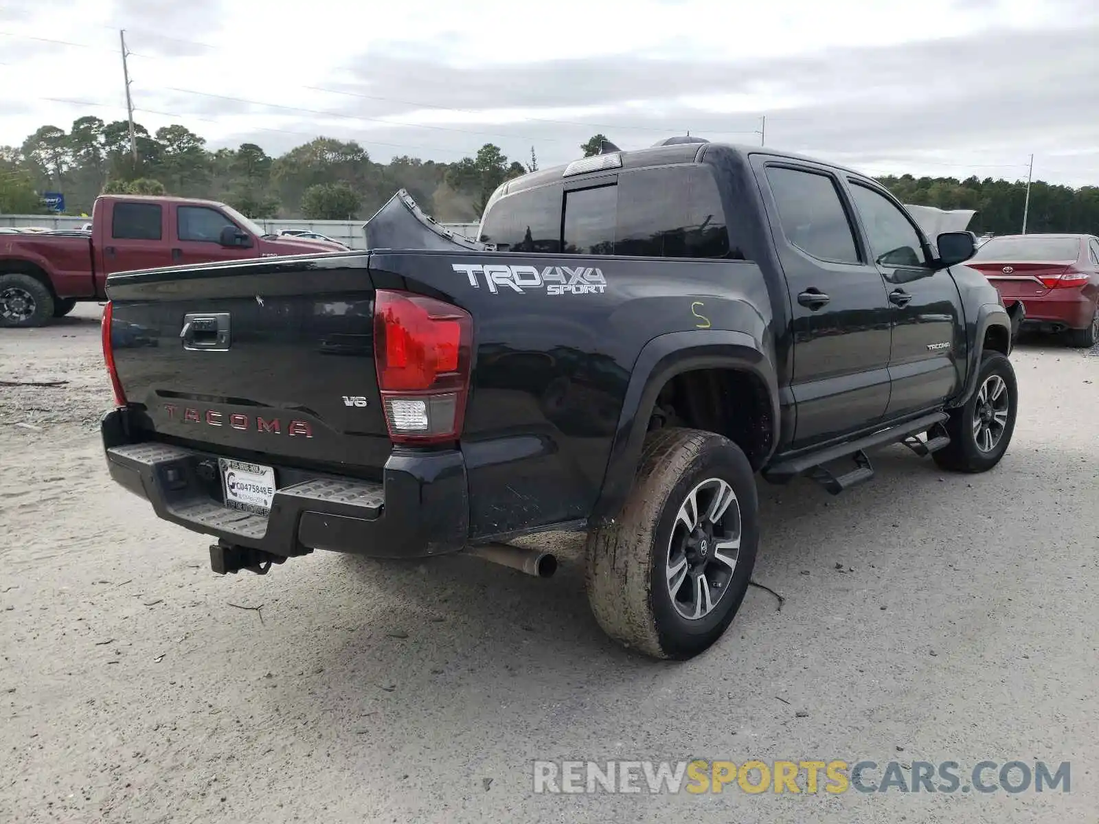 4 Photograph of a damaged car 3TMCZ5AN3KM223420 TOYOTA TACOMA 2019