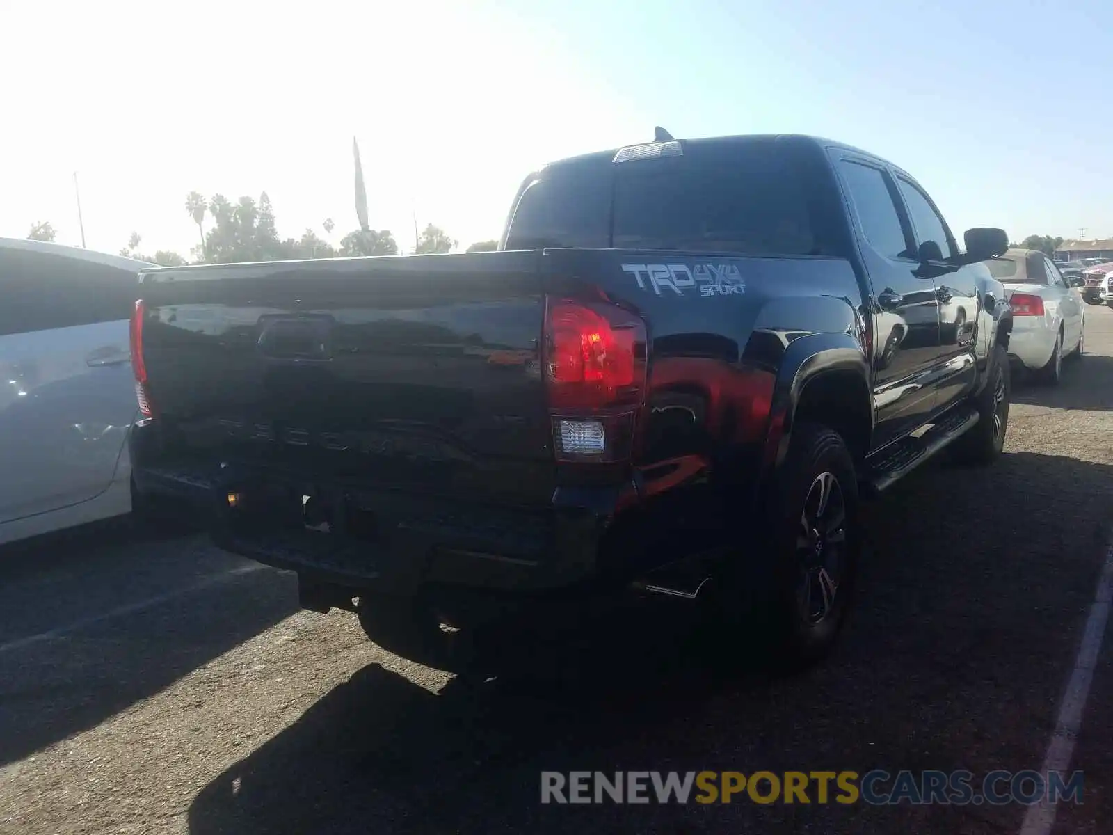 4 Photograph of a damaged car 3TMCZ5AN3KM226589 TOYOTA TACOMA 2019