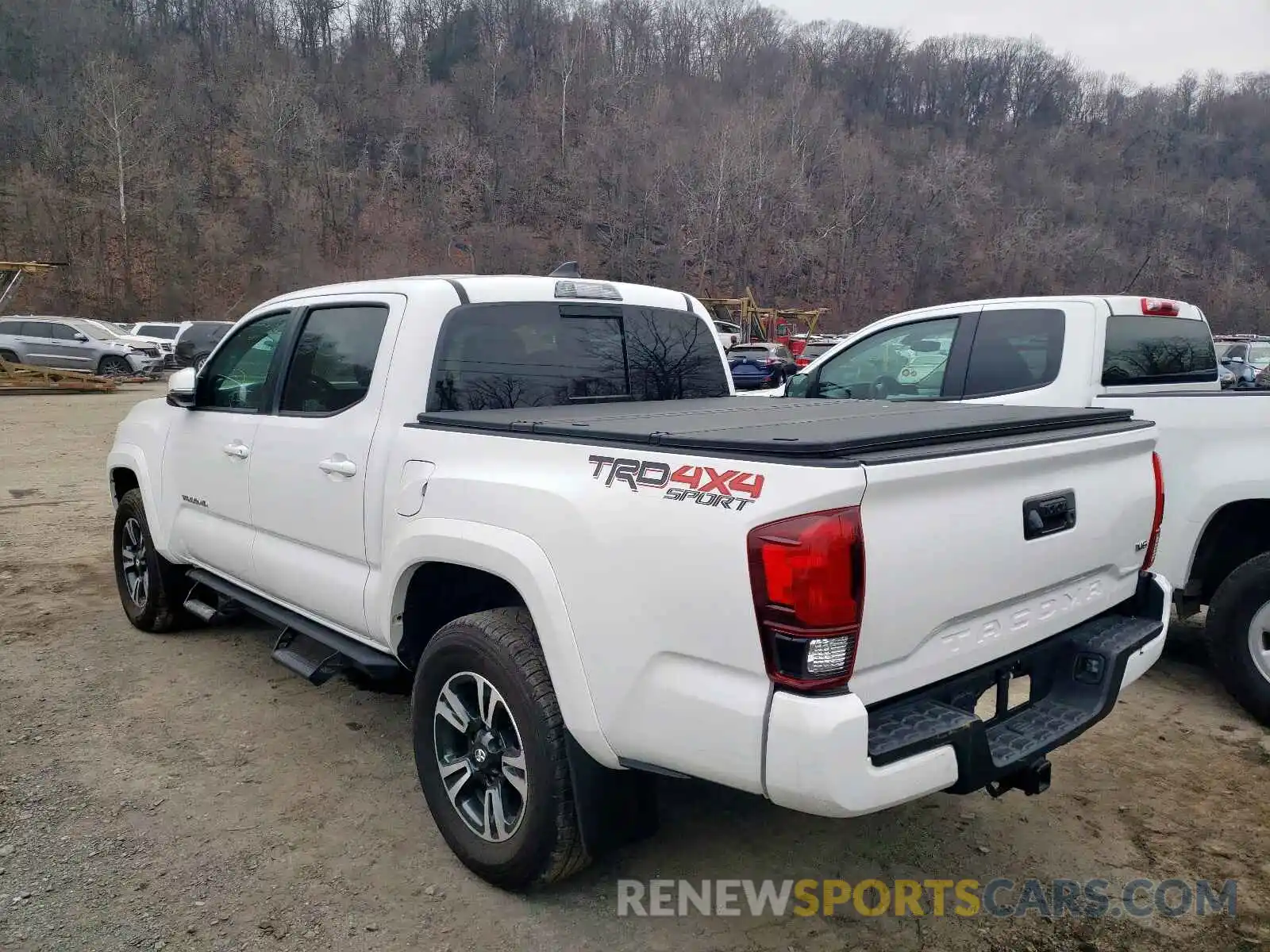 3 Photograph of a damaged car 3TMCZ5AN3KM228696 TOYOTA TACOMA 2019