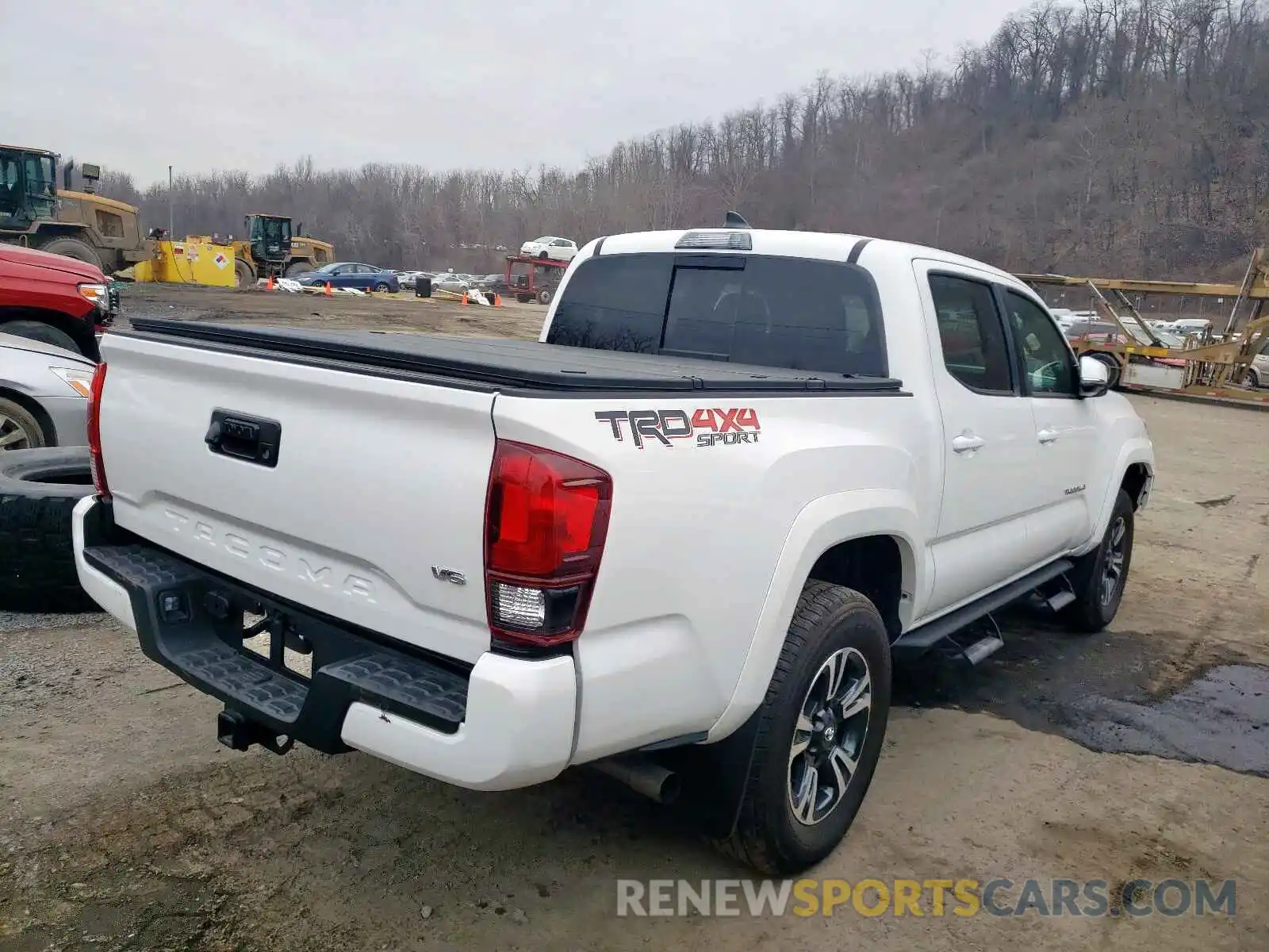 4 Photograph of a damaged car 3TMCZ5AN3KM228696 TOYOTA TACOMA 2019