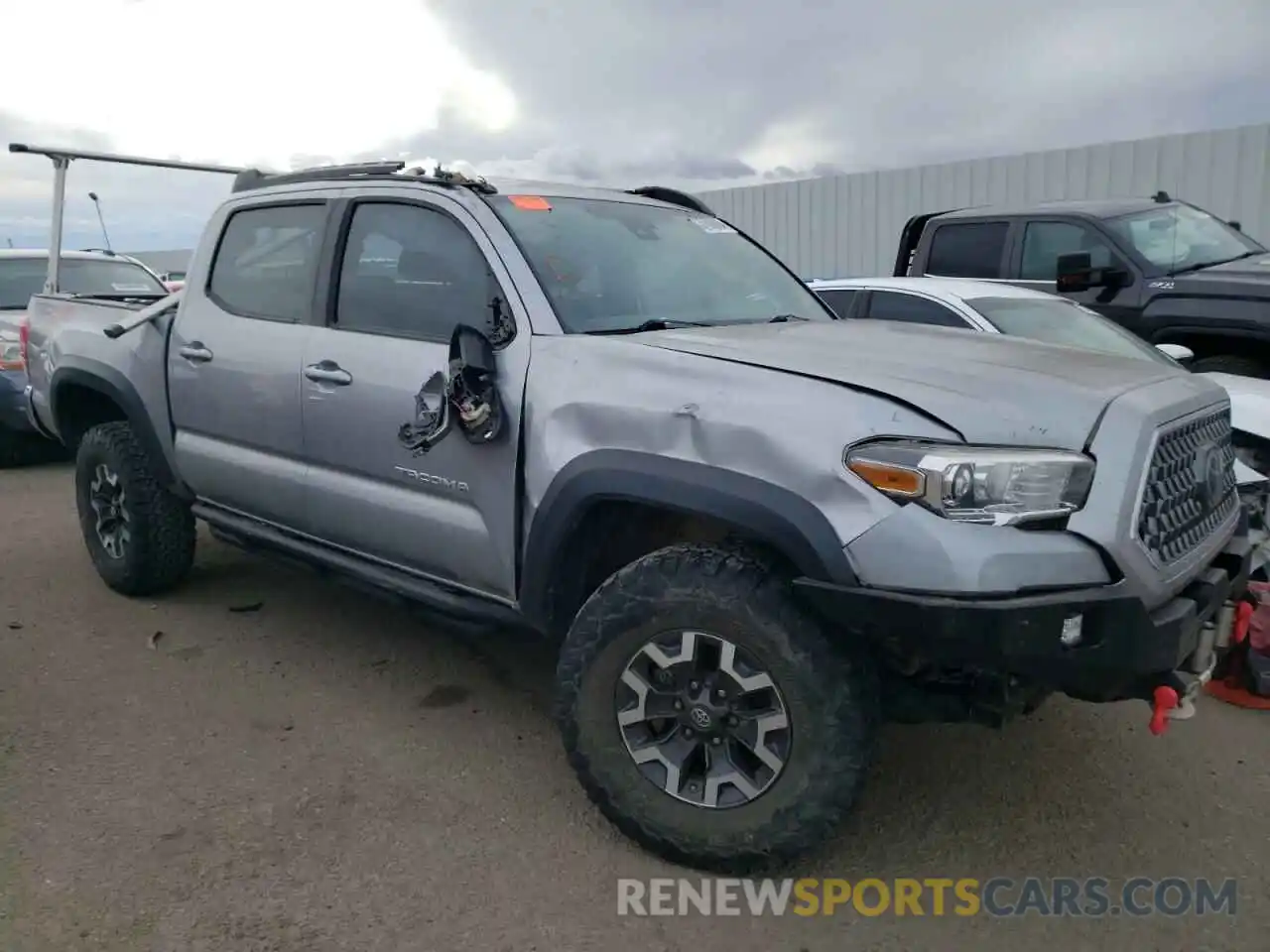 4 Photograph of a damaged car 3TMCZ5AN3KM233445 TOYOTA TACOMA 2019