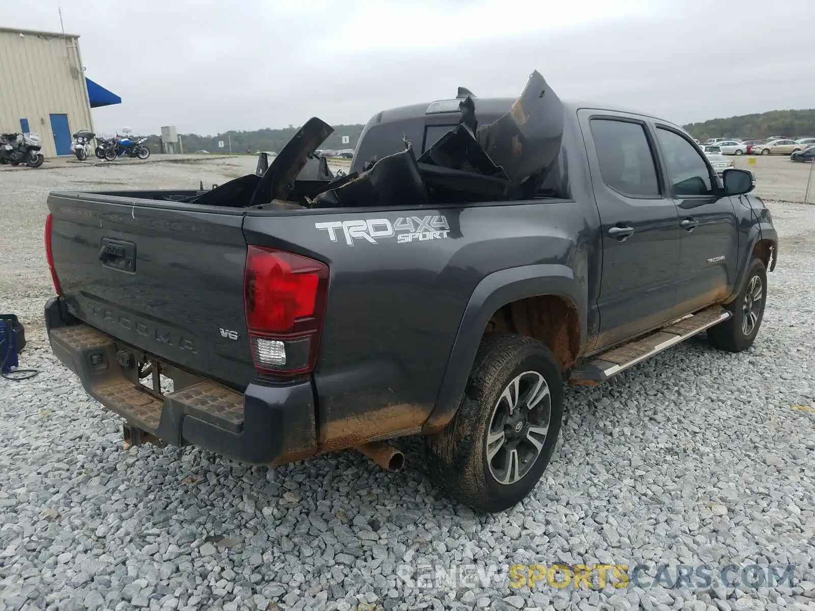 4 Photograph of a damaged car 3TMCZ5AN3KM234594 TOYOTA TACOMA 2019