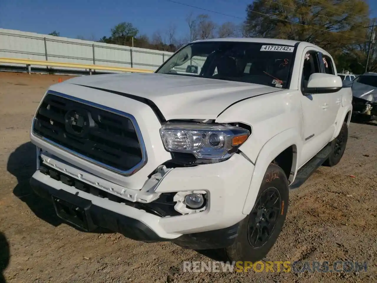 2 Photograph of a damaged car 3TMCZ5AN3KM235115 TOYOTA TACOMA 2019