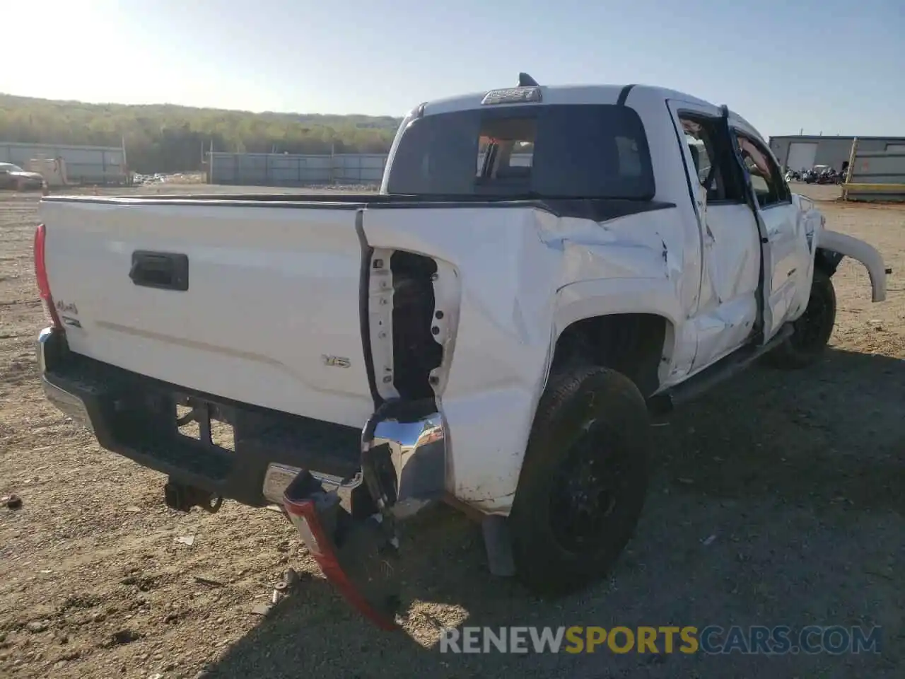 4 Photograph of a damaged car 3TMCZ5AN3KM235115 TOYOTA TACOMA 2019