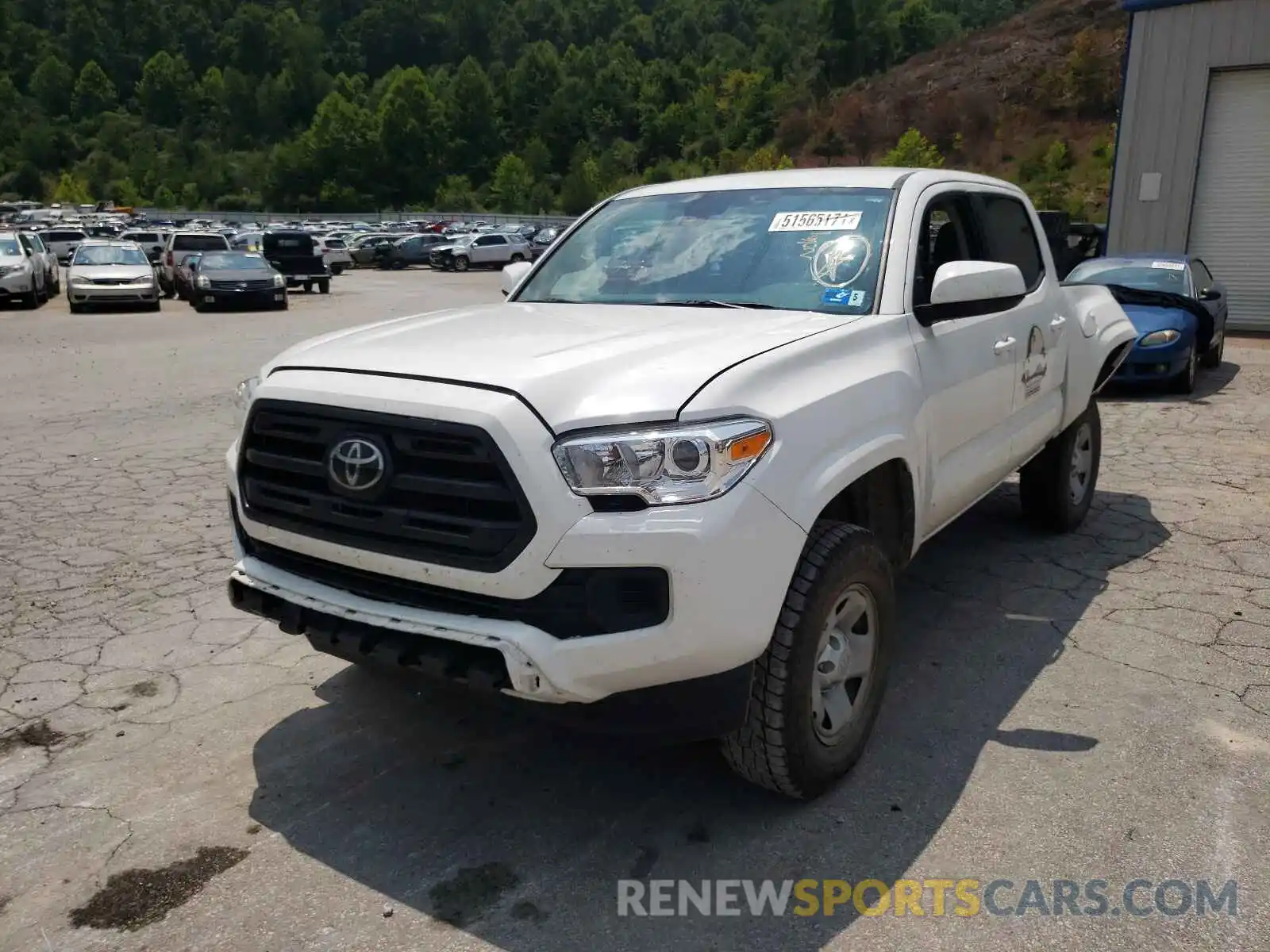 2 Photograph of a damaged car 3TMCZ5AN3KM236460 TOYOTA TACOMA 2019