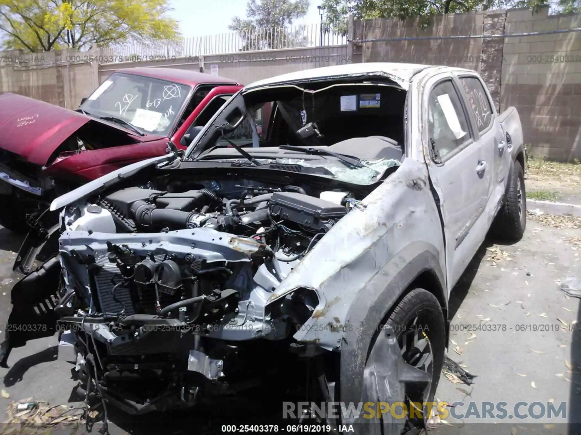 2 Photograph of a damaged car 3TMCZ5AN3KM237964 TOYOTA TACOMA 2019