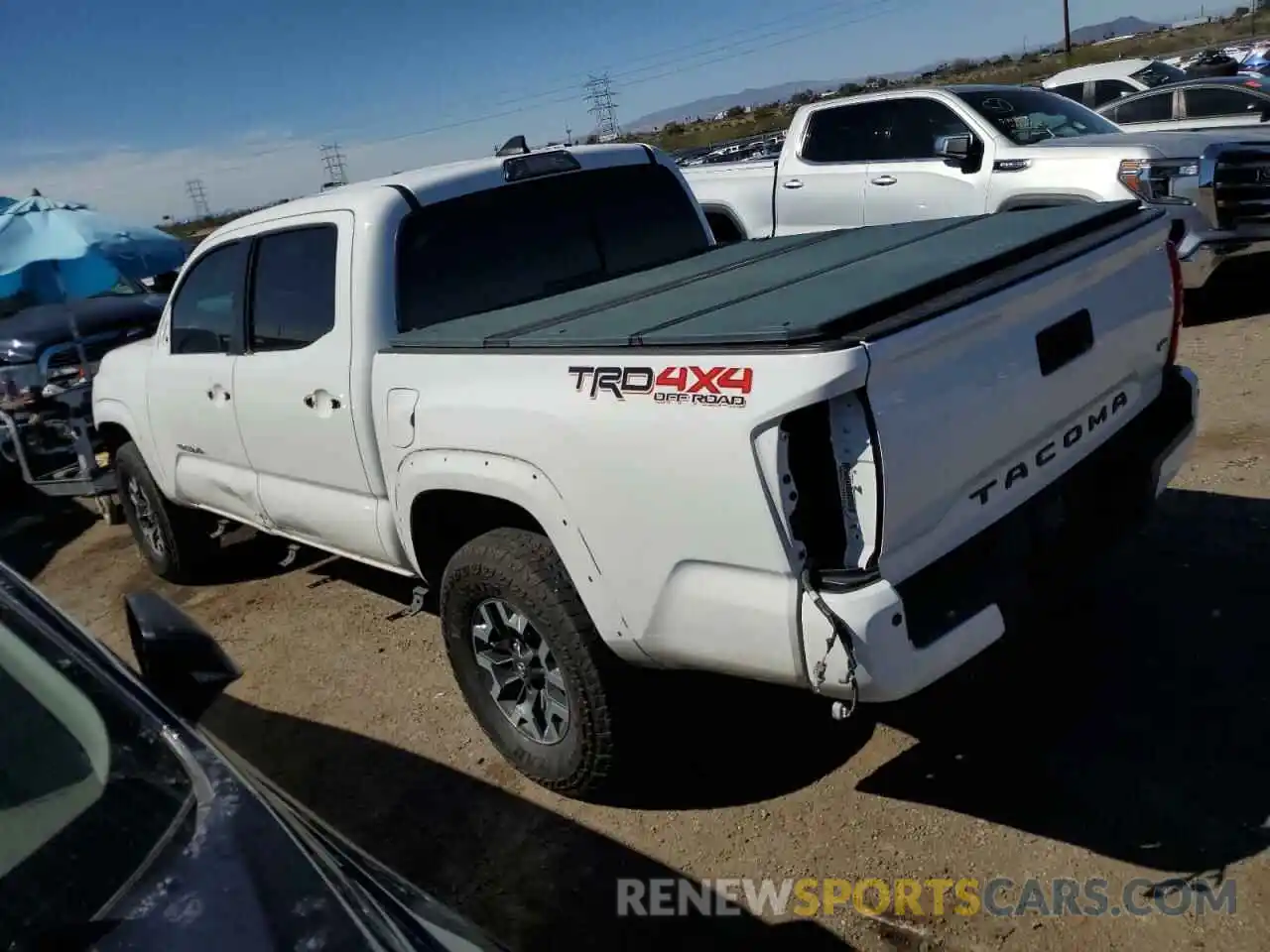 2 Photograph of a damaged car 3TMCZ5AN3KM239973 TOYOTA TACOMA 2019