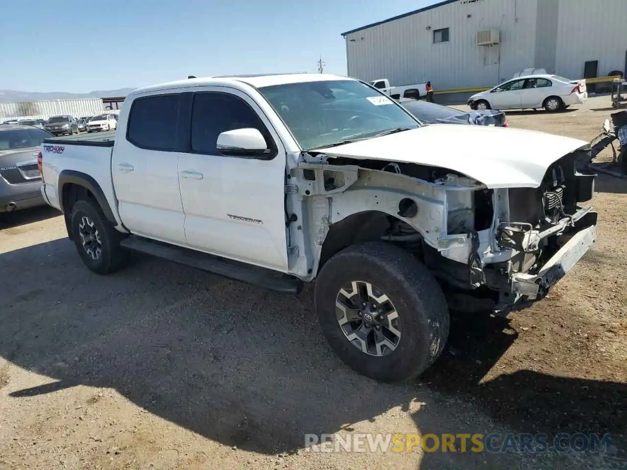 4 Photograph of a damaged car 3TMCZ5AN3KM239973 TOYOTA TACOMA 2019