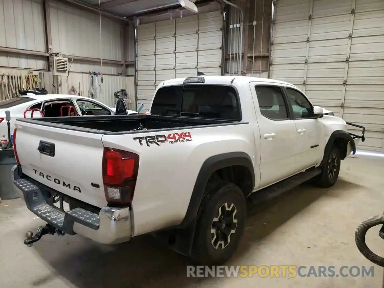 4 Photograph of a damaged car 3TMCZ5AN3KM242534 TOYOTA TACOMA 2019