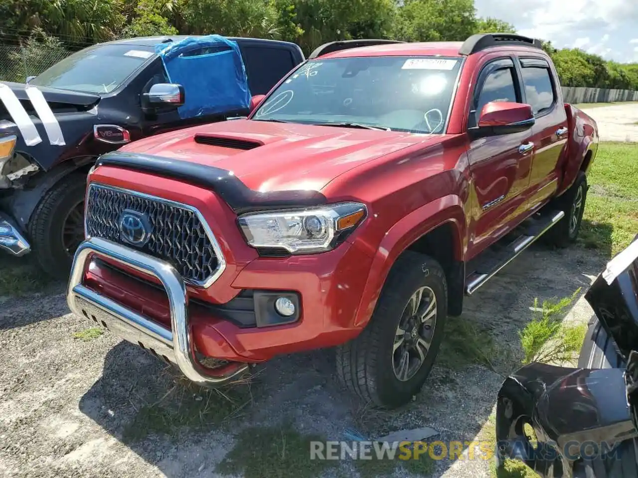 2 Photograph of a damaged car 3TMCZ5AN3KM243182 TOYOTA TACOMA 2019