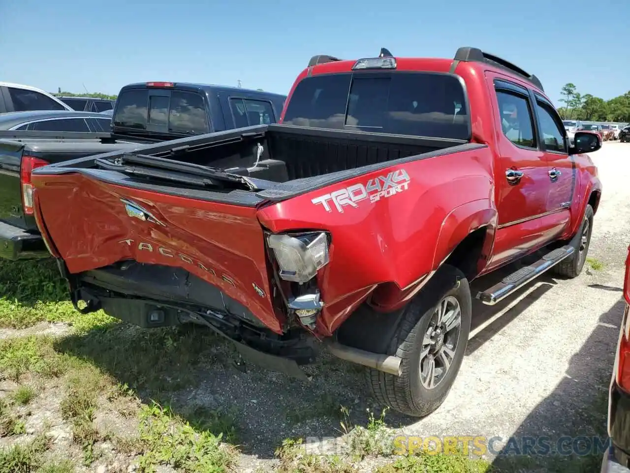 4 Photograph of a damaged car 3TMCZ5AN3KM243182 TOYOTA TACOMA 2019