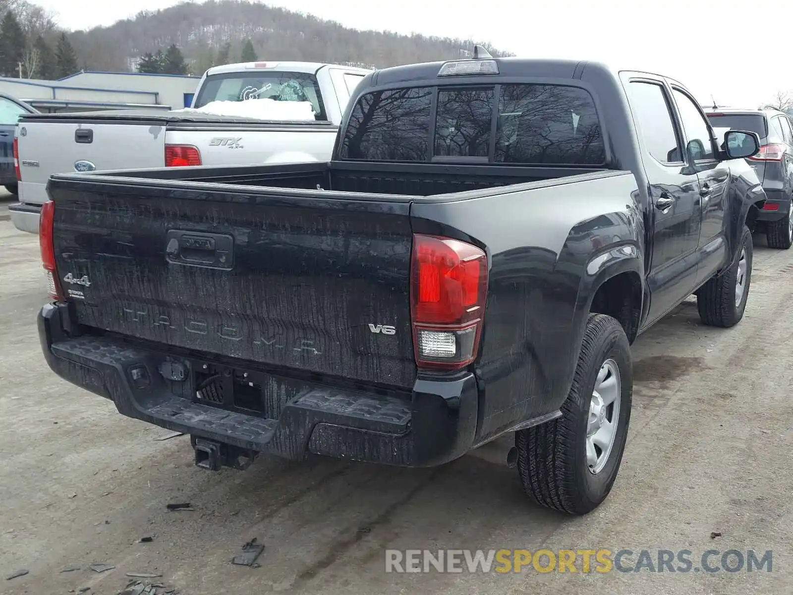 4 Photograph of a damaged car 3TMCZ5AN3KM246972 TOYOTA TACOMA 2019