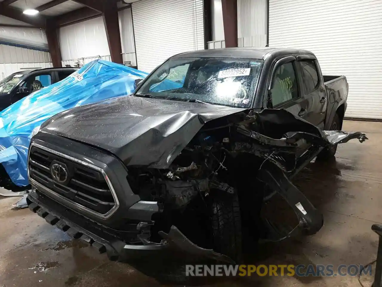 2 Photograph of a damaged car 3TMCZ5AN3KM247345 TOYOTA TACOMA 2019