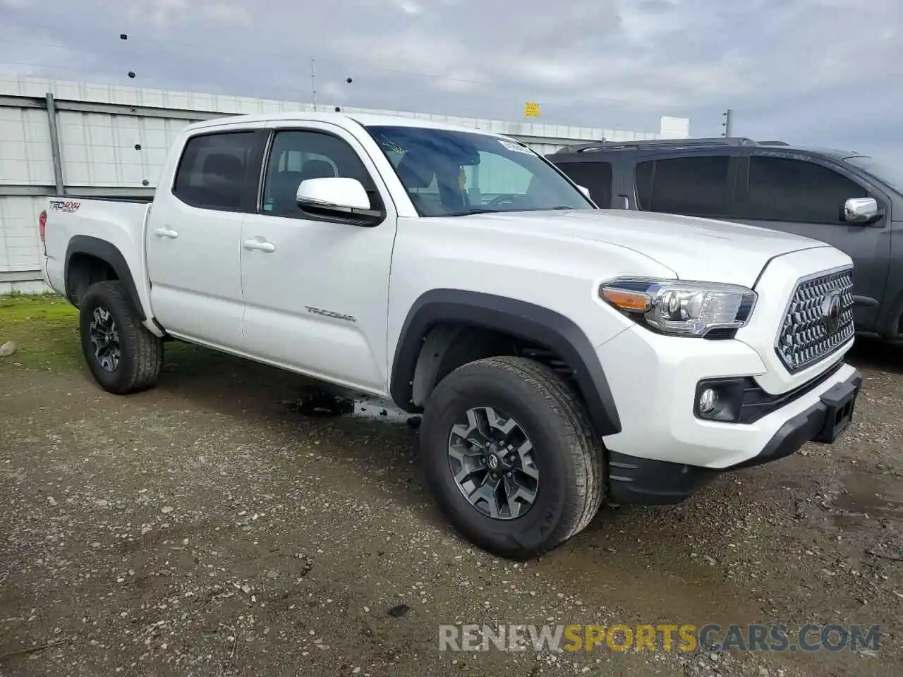 4 Photograph of a damaged car 3TMCZ5AN3KM253081 TOYOTA TACOMA 2019