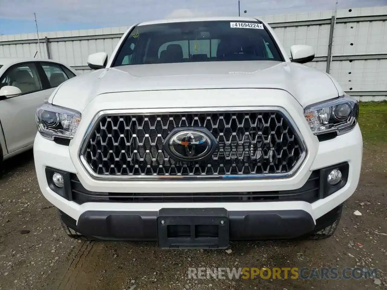 5 Photograph of a damaged car 3TMCZ5AN3KM253081 TOYOTA TACOMA 2019