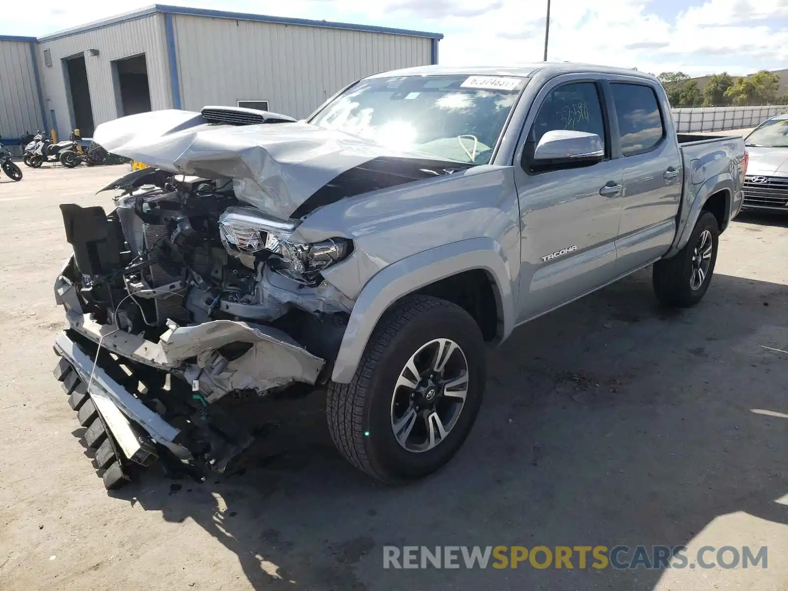 2 Photograph of a damaged car 3TMCZ5AN3KM254697 TOYOTA TACOMA 2019