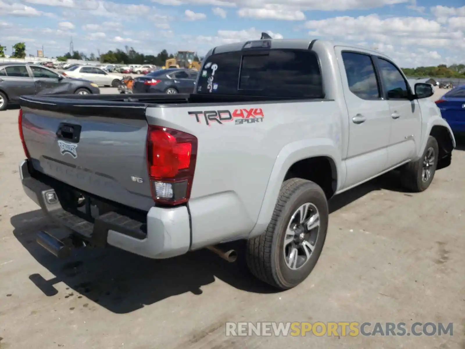 4 Photograph of a damaged car 3TMCZ5AN3KM254697 TOYOTA TACOMA 2019