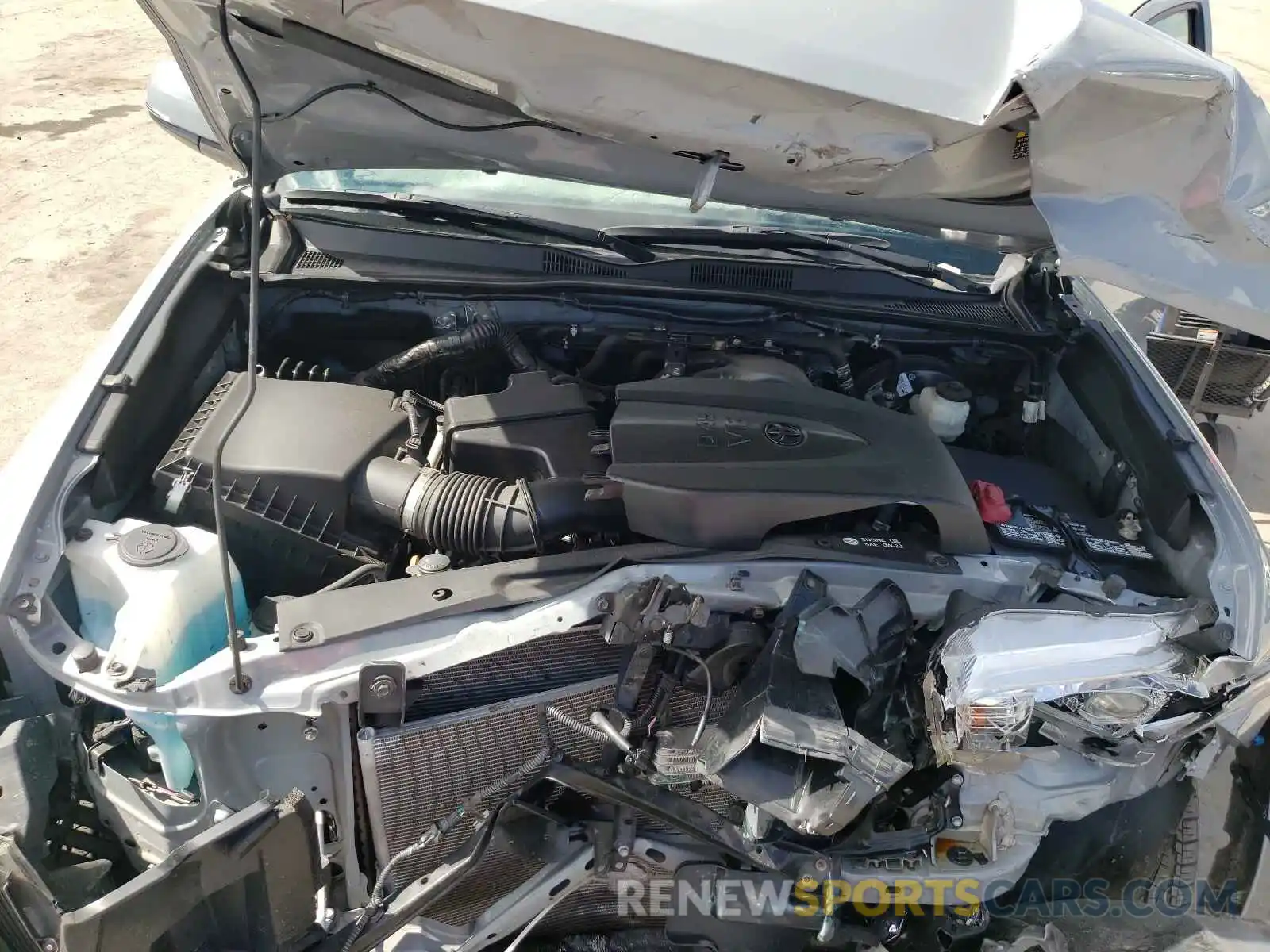 7 Photograph of a damaged car 3TMCZ5AN3KM254697 TOYOTA TACOMA 2019