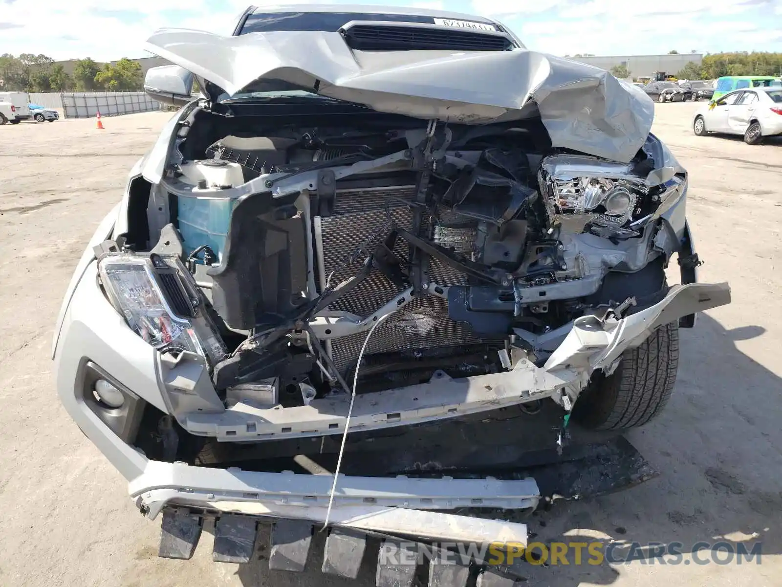 9 Photograph of a damaged car 3TMCZ5AN3KM254697 TOYOTA TACOMA 2019