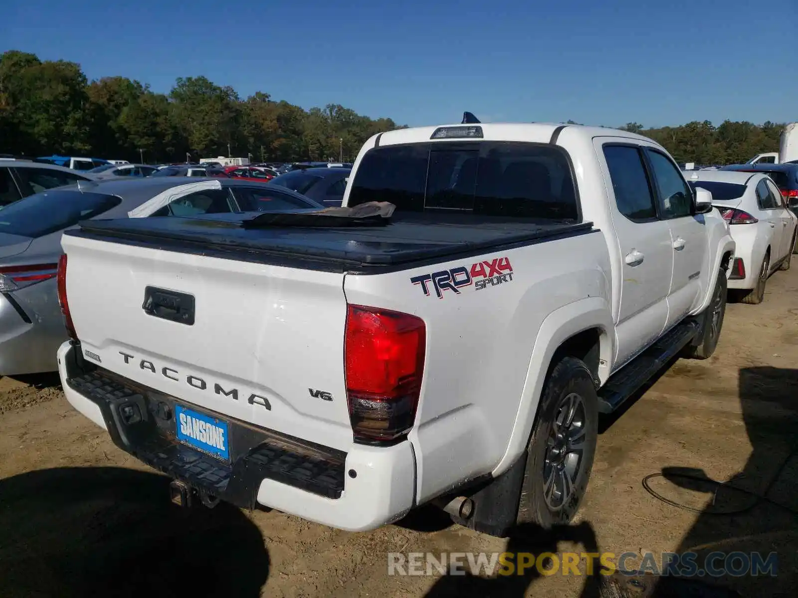 4 Photograph of a damaged car 3TMCZ5AN3KM255445 TOYOTA TACOMA 2019