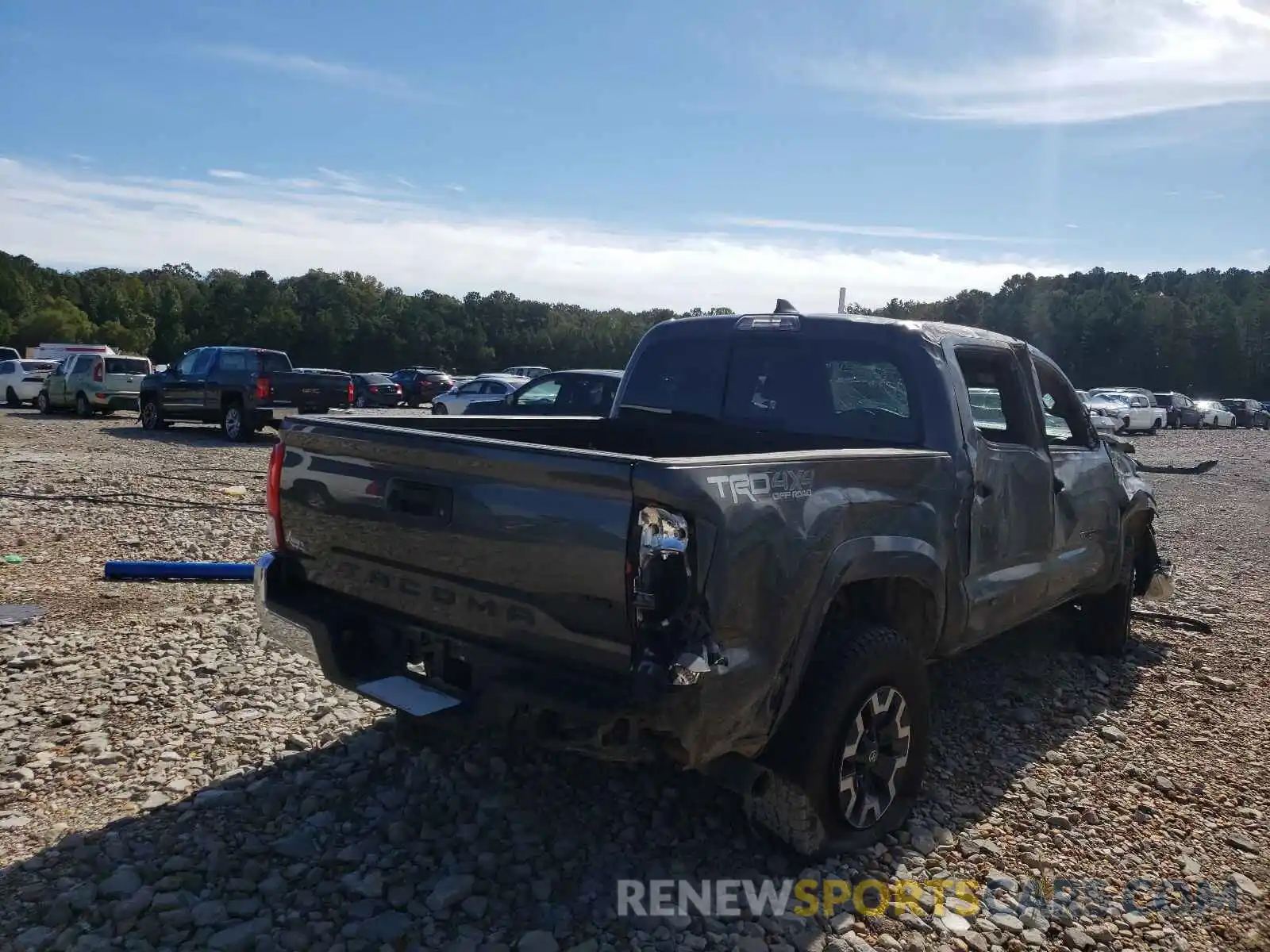 4 Photograph of a damaged car 3TMCZ5AN3KM260435 TOYOTA TACOMA 2019