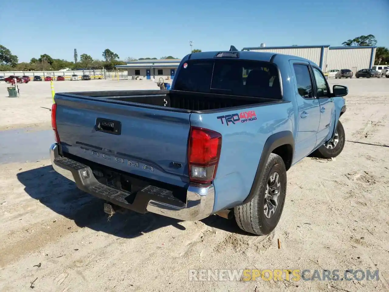 4 Photograph of a damaged car 3TMCZ5AN3KM260726 TOYOTA TACOMA 2019