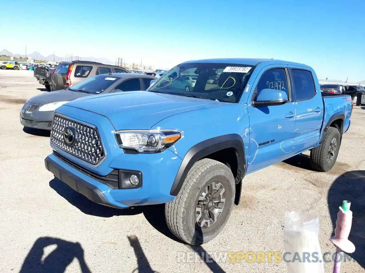 2 Photograph of a damaged car 3TMCZ5AN3KM262072 TOYOTA TACOMA 2019