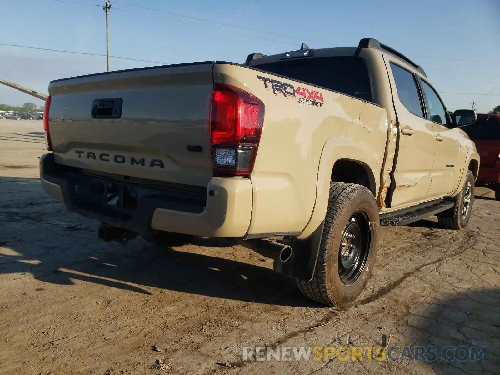 4 Photograph of a damaged car 3TMCZ5AN3KM266610 TOYOTA TACOMA 2019