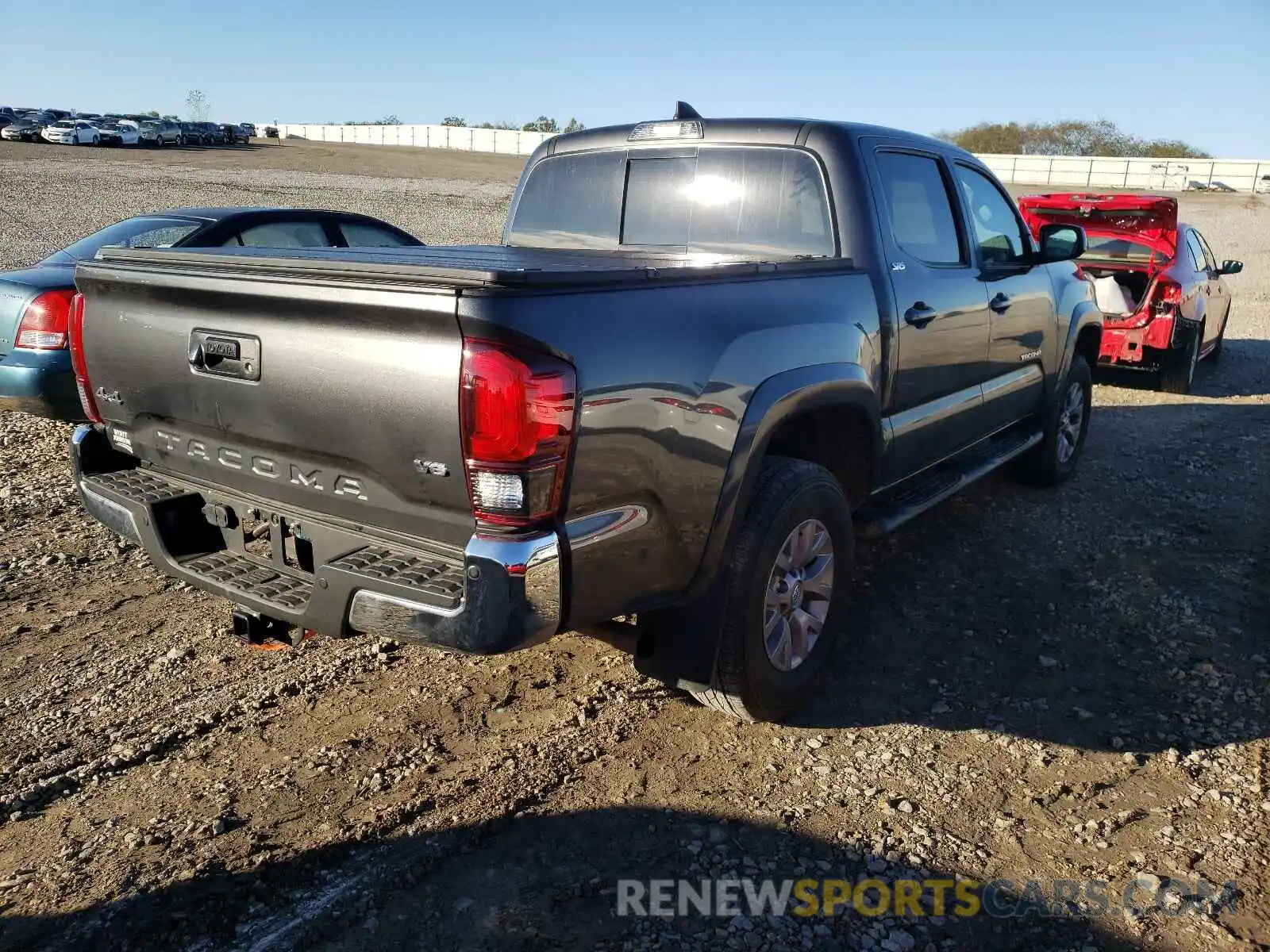 4 Photograph of a damaged car 3TMCZ5AN3KM269376 TOYOTA TACOMA 2019