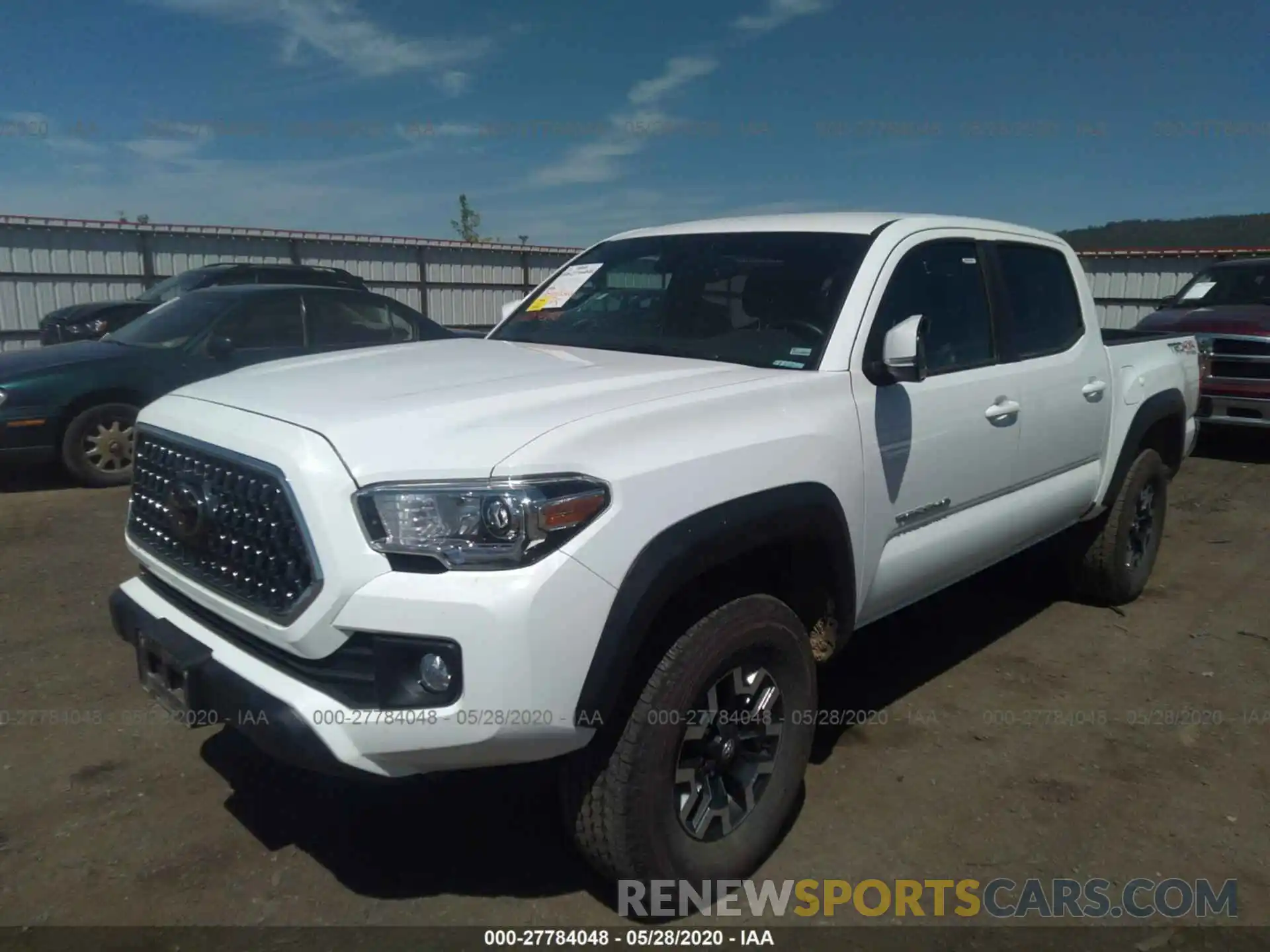 2 Photograph of a damaged car 3TMCZ5AN3KM272486 TOYOTA TACOMA 2019