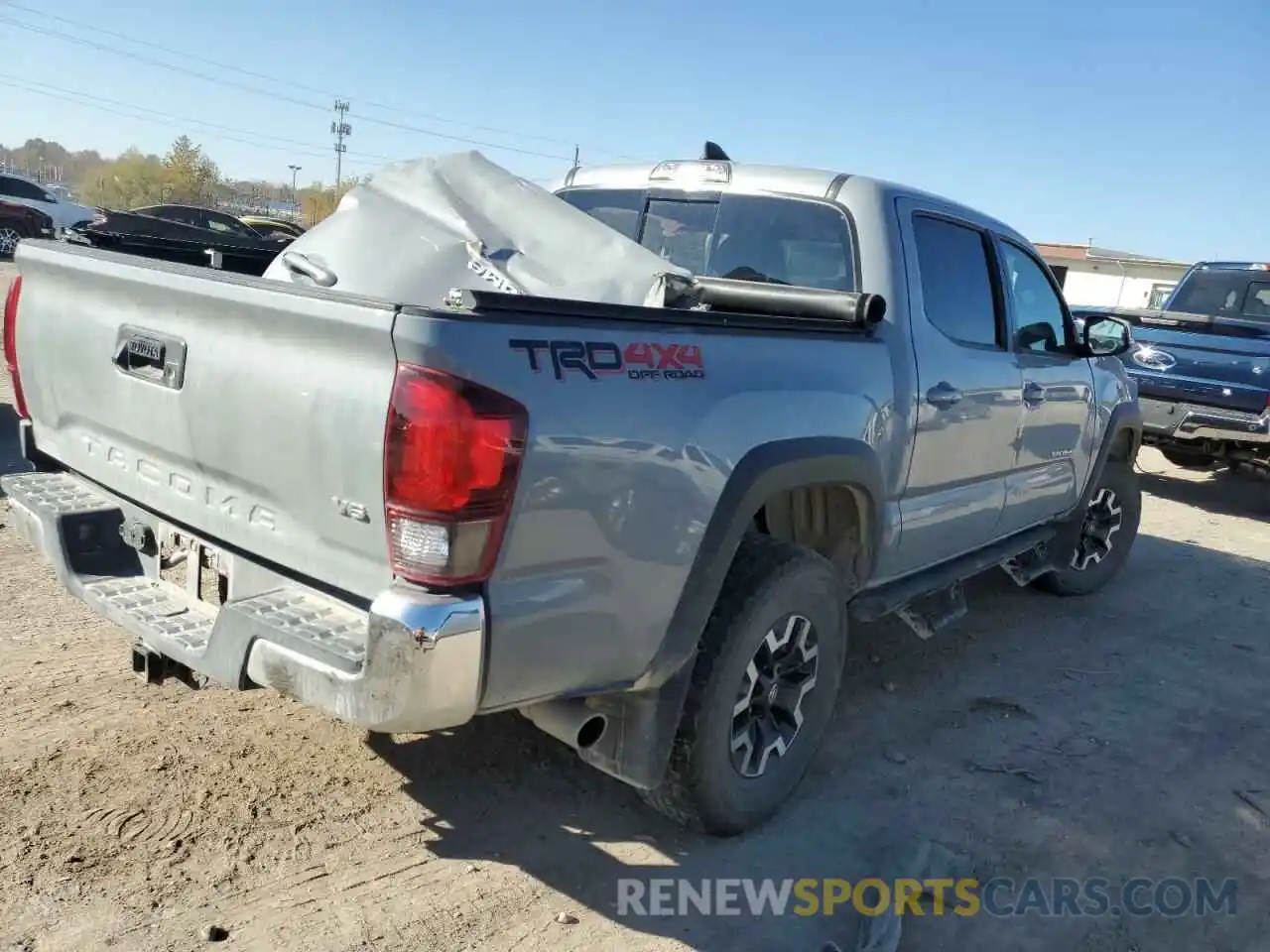 4 Photograph of a damaged car 3TMCZ5AN3KM272827 TOYOTA TACOMA 2019