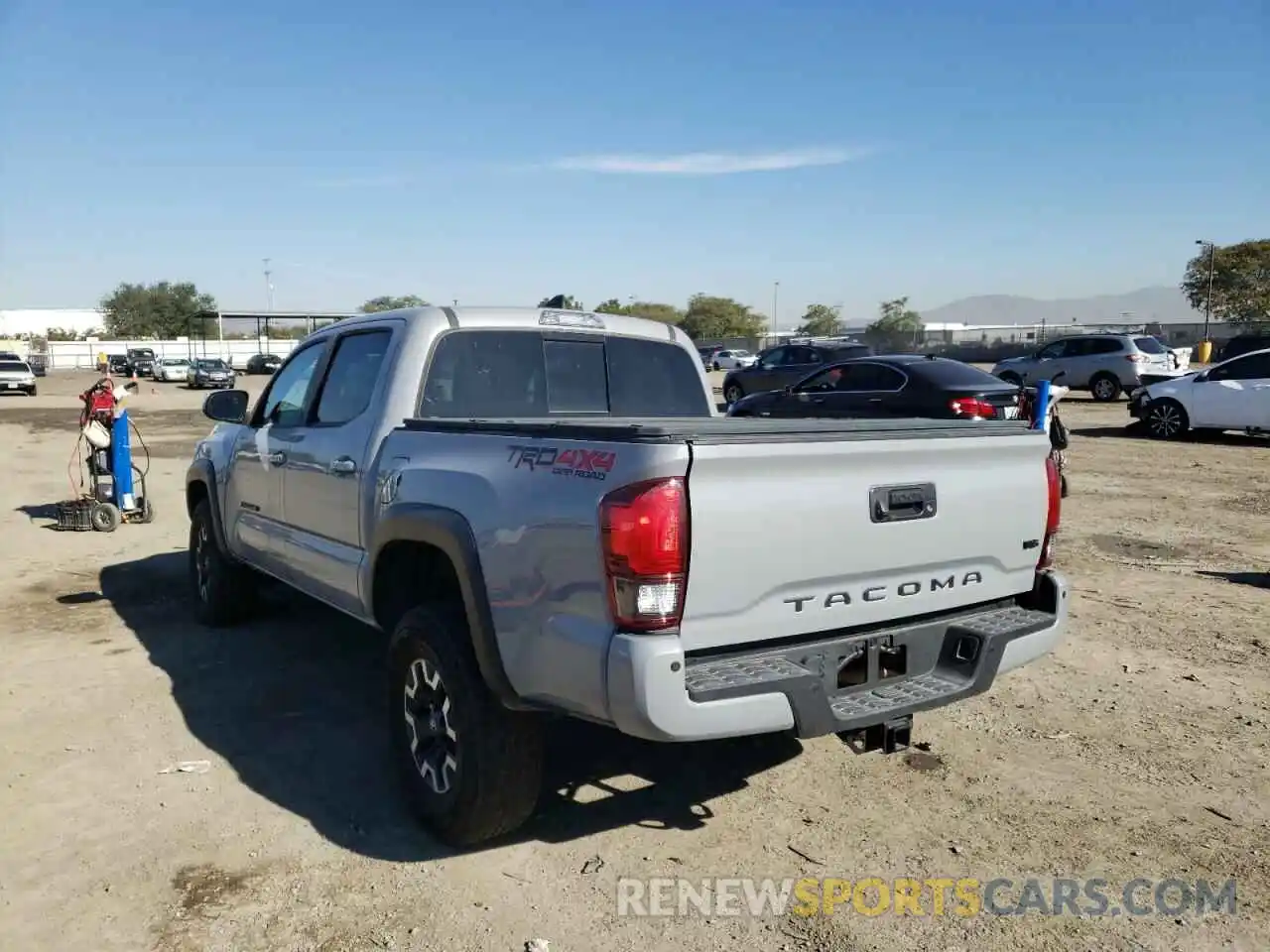 3 Photograph of a damaged car 3TMCZ5AN3KM273394 TOYOTA TACOMA 2019